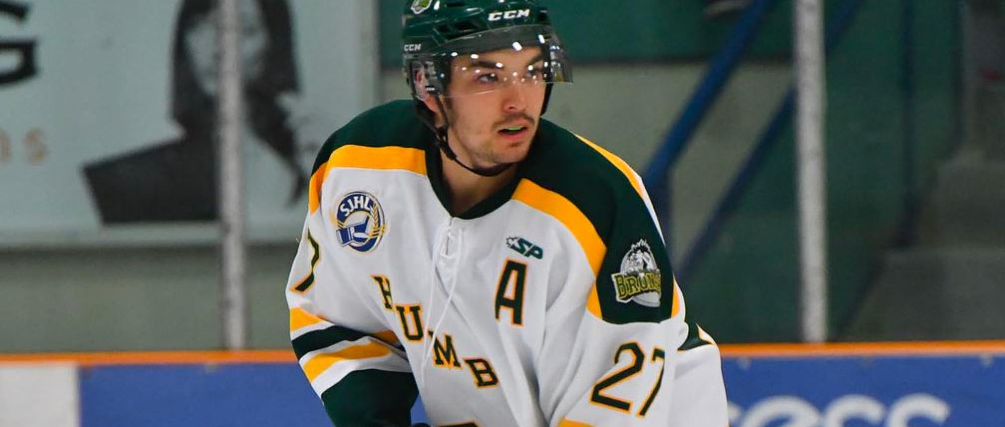 Logan Boulet in on ice in Hockey Uniform